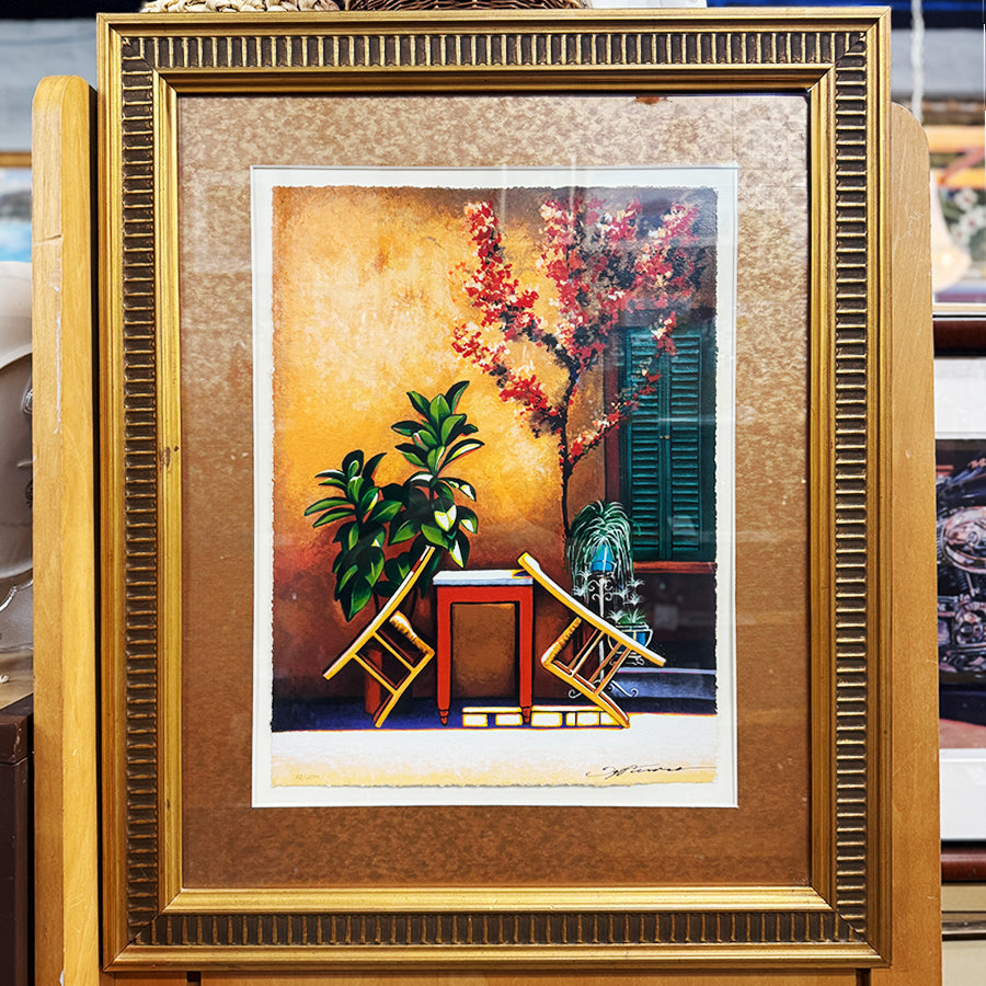 Gone Fishing vignette of outdoore tabel chairs and plants
