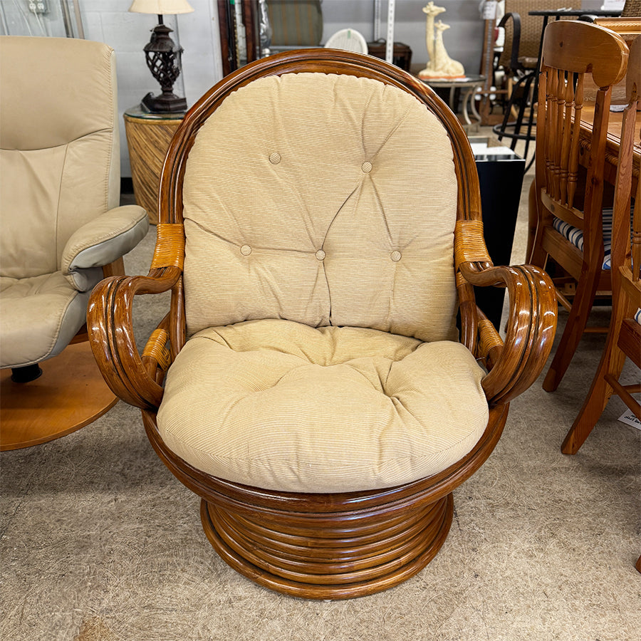Chair- rattan, w/ tan cushions, swivel