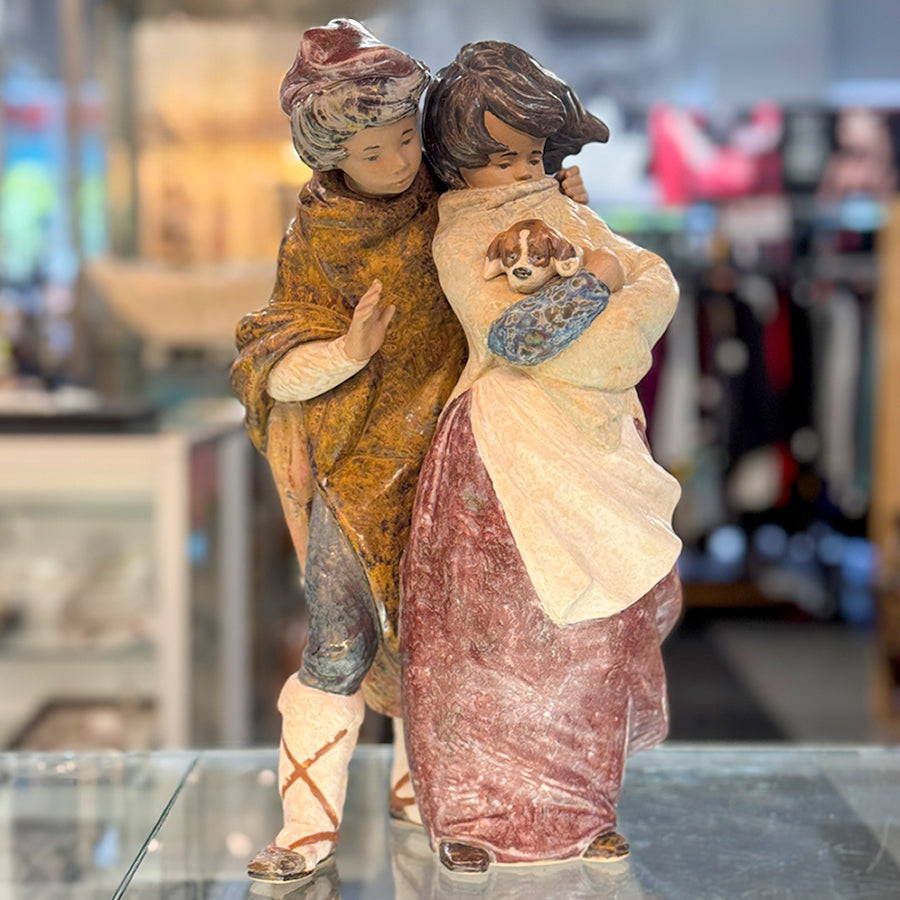 Lladro 'Facing the Wind' Figurine