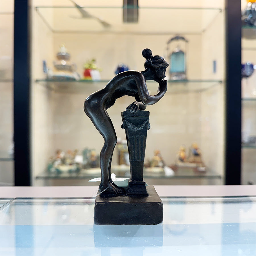 Milo Figurine of Nide Woman Leaning on Podium