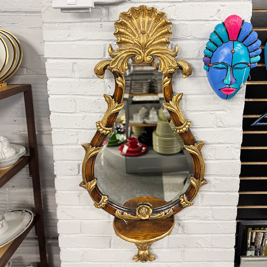 gilt and wood framed beveled mirror teardrop shape