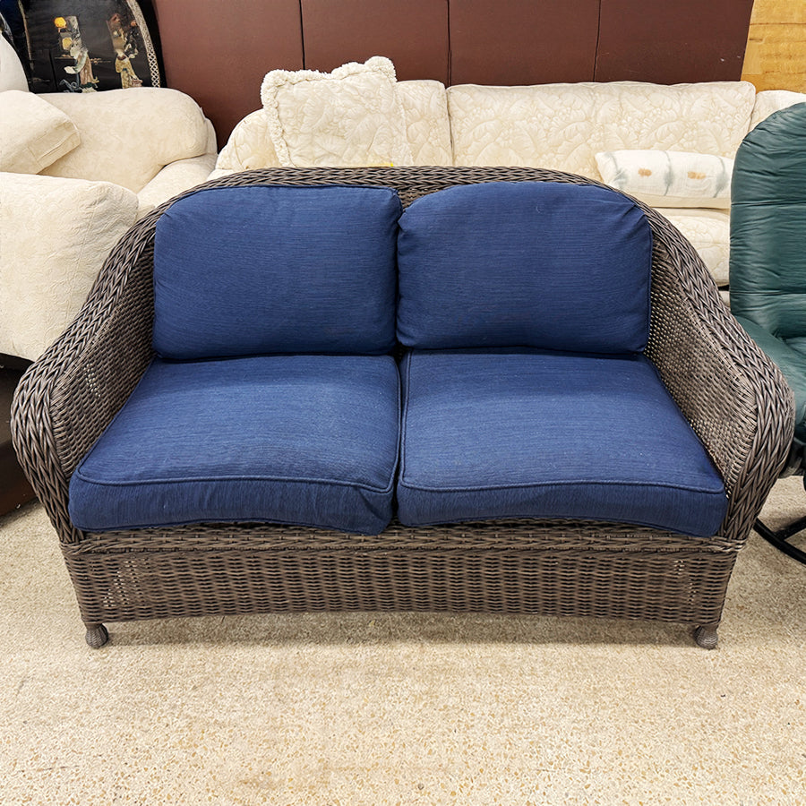 loveseat brown OD wicker w blue cushions