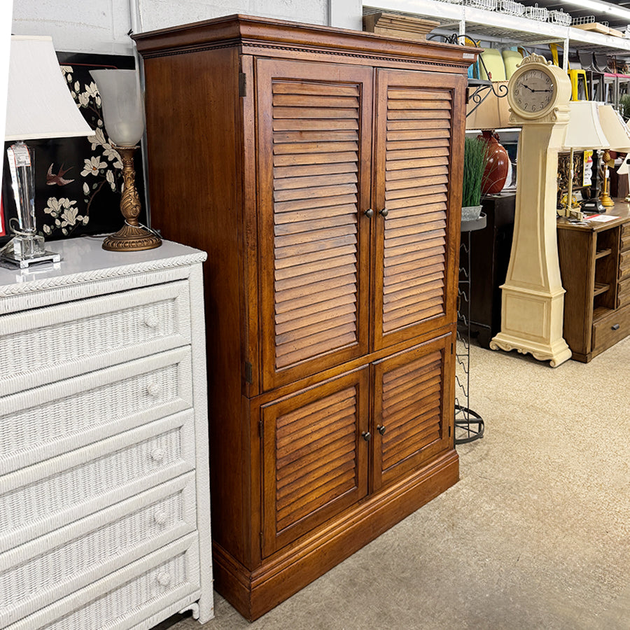 Armorie- wood, doors, spot for a TV.